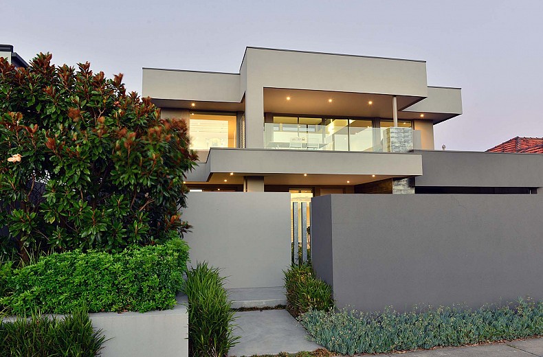 Articulated wall panels, floor and roof planes, and garden beds provide a glimpse of what is beyond.