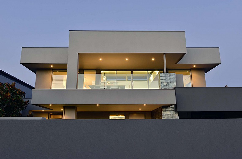 The simple crisp lines of the upper floor.