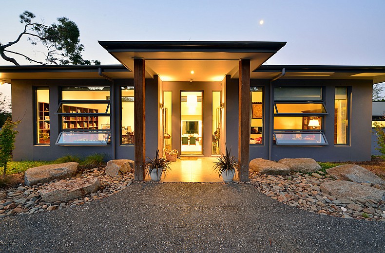High ceiling and plenty of light are welcoming, study to the left and a cosy sitting room with fire to the right.